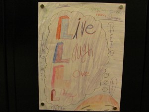 child's drawing of "live, laugh, love, library"