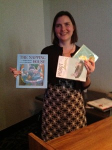 Erin Reilly Sanders holding books