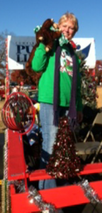 YS Library Associate Sarah Thornton greets the audience with her story time puppet
