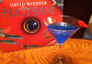 book cover of Flotsam by david Weisner next to a cocktail glass