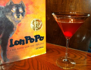 book cover of Lon Po Po by Ed Young next to a cocktail