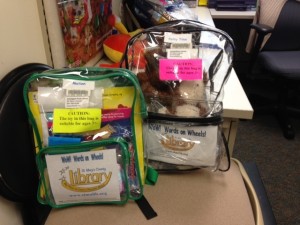 words on wheels backpack with books and toys