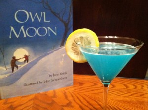 book cover of Owl Moon by Jane Yolen next to cocktail