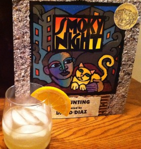 book cover of Smoky Night next to cocktail