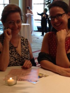two women read to play bingo