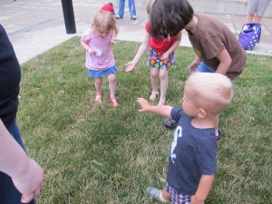 children watching butterflies fly away