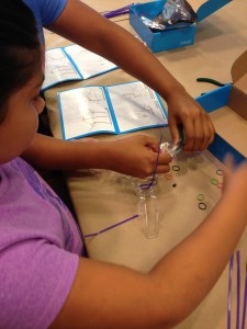 two kids building a Spinbot