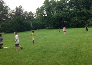 children playing kickball