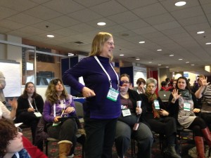 Marge Loch-Waters teaching "Five Little Monkeys" in sign language