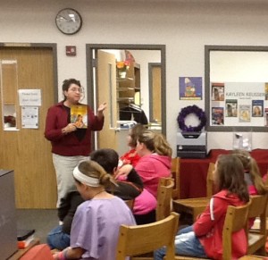 adult reading aloud to kids