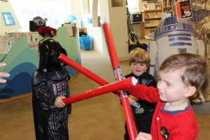 kids having a lightsaber battle