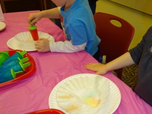 children making popsicle art