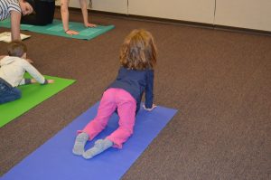 child doing yoga
