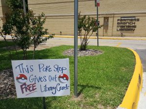 sign for Poke Stop outside library