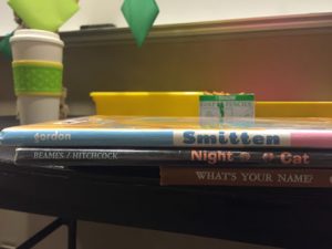 spines of books on a table