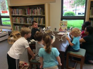 Children using technology at the library