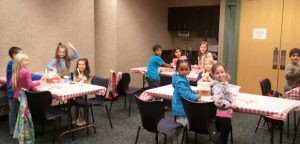 Children doing crafts at the library