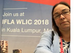 headshot of Christine Caputo at IFLA