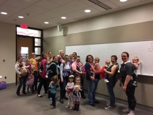 A group of participants at the BabyWearing Dance Party