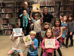 Caldecott Club kids holding their favorite books