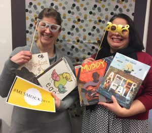 Two librarians celebrating the Mock Caldecott