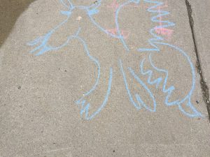 Child's chalk drawing of a dragon