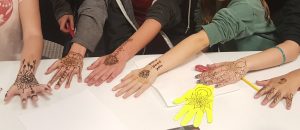 Images of hands after a successful program collaboration