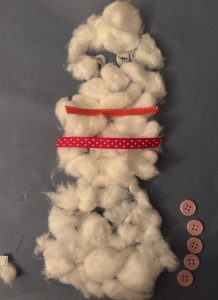 A snowman made from cotton balls.