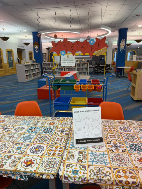 Children's room photo with a CREATE station, art supplies, decorated table