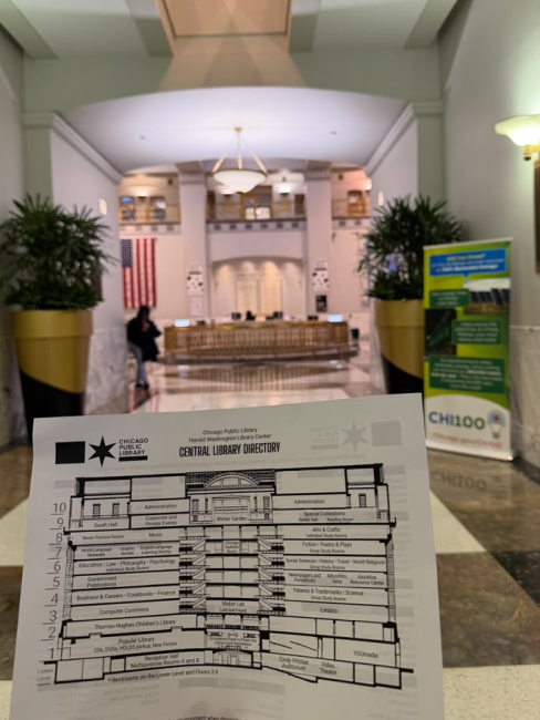 Chicago Public Library lobby with a paper map showing the building floorplan